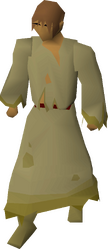 A male player wearing slave robes.